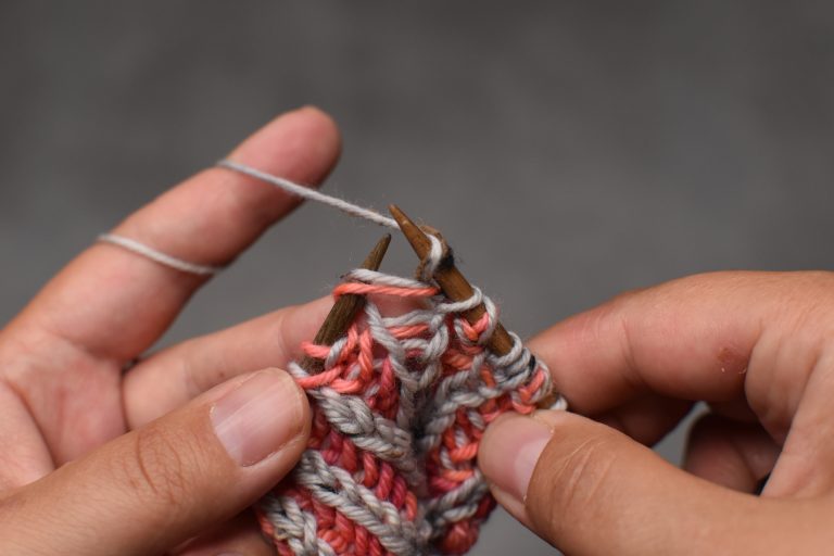 Step 2: Yarn-over (bring the working yarn under the needle to the front and over the needle to the back again).