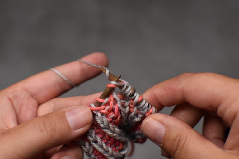 Step 5: Brioche knit same stitch again, finally taking it off the left-hand needle.