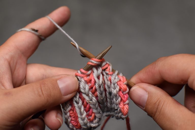 Step 2: Knit the next two stitches together.