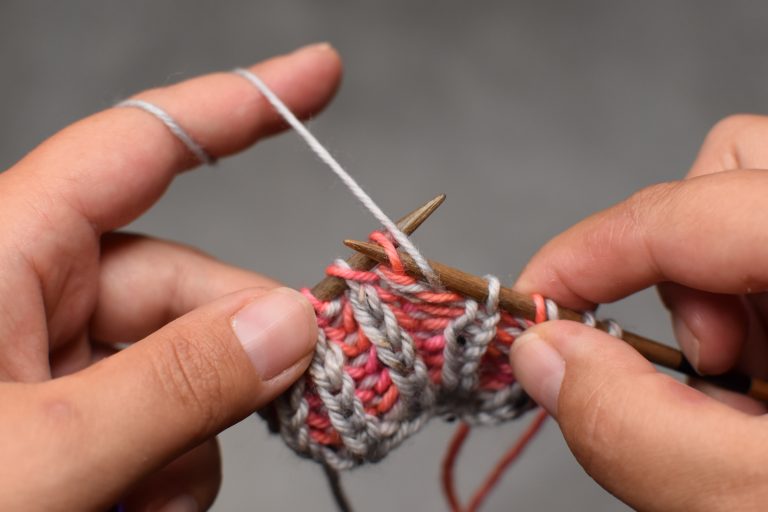 Step 2: Insert needle purl-wise (from back to front).