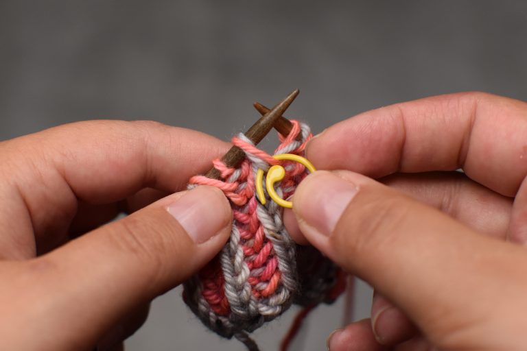 Step 3: Place a removable stitch marker on the next stitch and its yarn-over (= center stitch)...