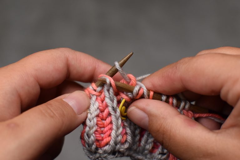 Step 7: Pass next stitch and its yarn-over over and off the needle.