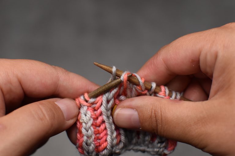 Step 9: Pass the first slipped stitch and its yarn-over (Step 1) over and off the needle.