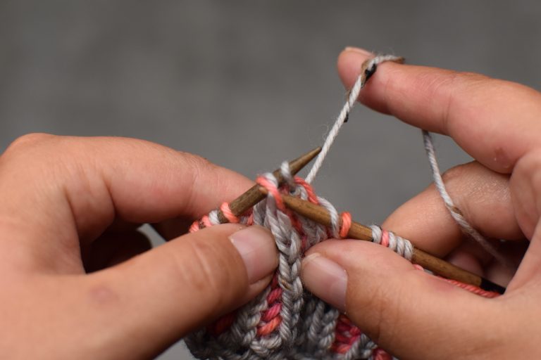 Step 12: Pass the center stitch over and off the needle.