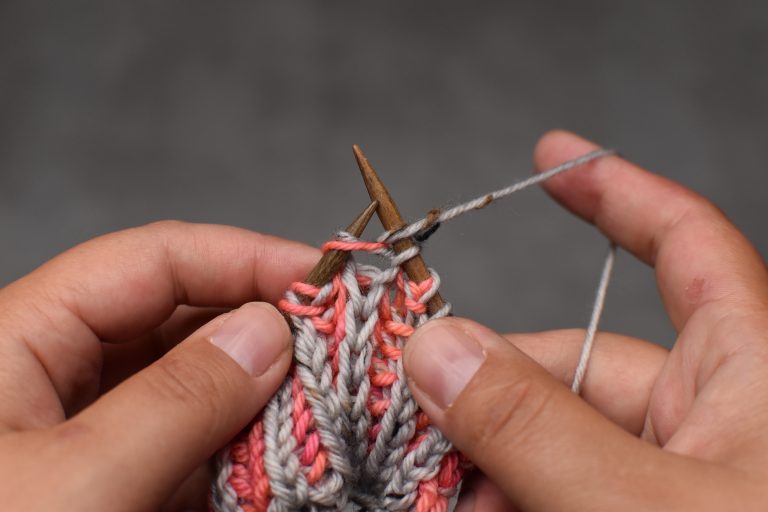 Step 2: Bring yarn to front.