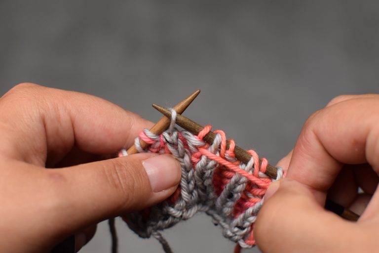 Step 1: With yarn already in front from previous purl/brioche purl stitch, slip stitch purl-wise.